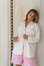Load image into Gallery viewer, Woman wearing a white corduroy shirt and pink shorts against a neutral background