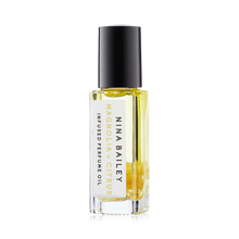 Load image into Gallery viewer, Citrus & Magnolia Crystal Infused Perfume Oil