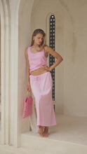 Load and play video in Gallery viewer, woman wearing a pink tank top and skirt
