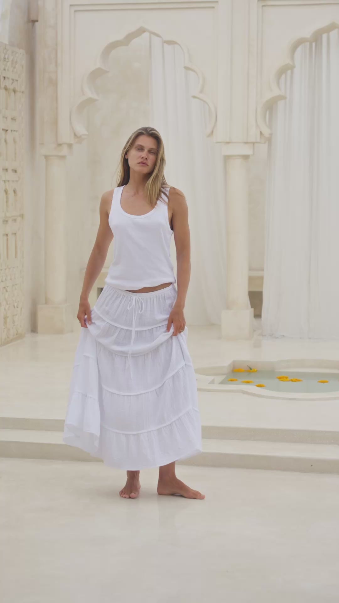Load video: Elation Tiered Maxi Skirt White