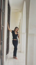 Load and play video in Gallery viewer, woman in black shirred top and shirred maxi skirt
