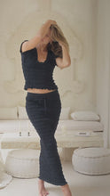 Load and play video in Gallery viewer, woman in black shirred top and shirred maxi skirt
